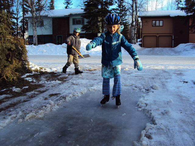 in spring, melting of the top snow revealed the ice from November; ice skating in drivewa