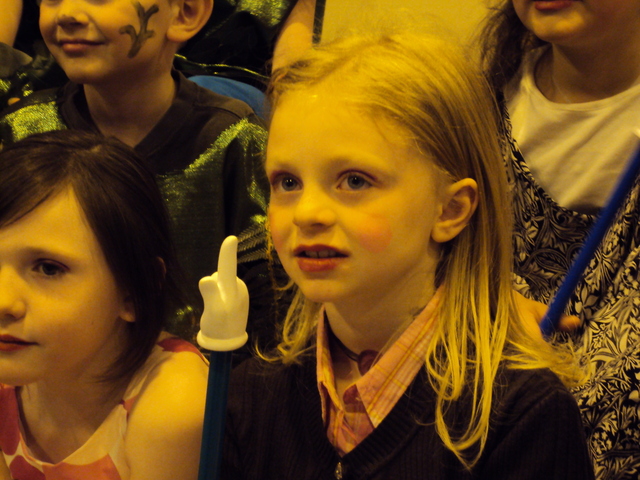 Vera's first grade class had a musical.  Vera went costumed as a teacher.